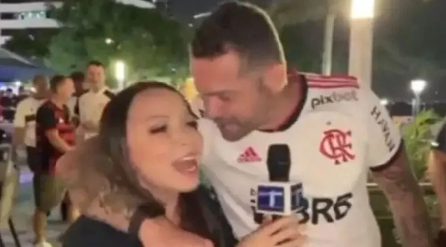 Torcedor do Flamengo assedia repórter