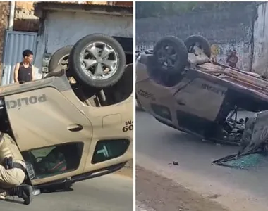 Carro bateu em viatura, que ficou com rodas para cima