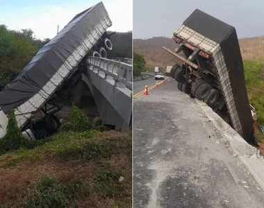 Caminhão ficou parcialmente pendurado em ponte