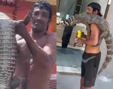 Homem caminha pelas ruas de Manaus com um jacaré no ombro