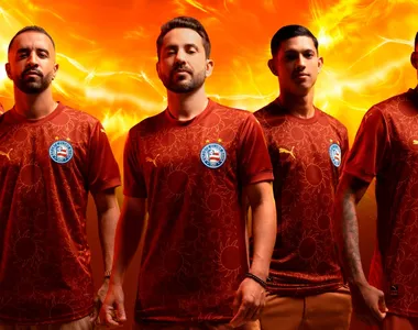 Nova camisa é da cor de vinho e tem sóis amarelos desenhados em sua composição