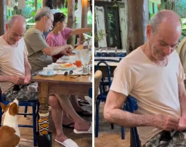 Ney Matogrosso alimenta cachorro em restaurante