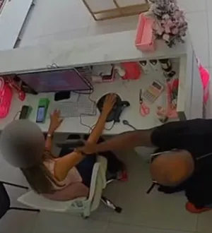 Imagem ilustrativa da imagem Foragido por violência doméstica invade loja e ameaça a ex com arma