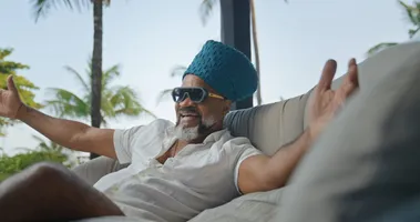 Imagem ilustrativa da imagem Carlinhos Brown exibe filhos, rotina e até a ex-sogra em série inédita