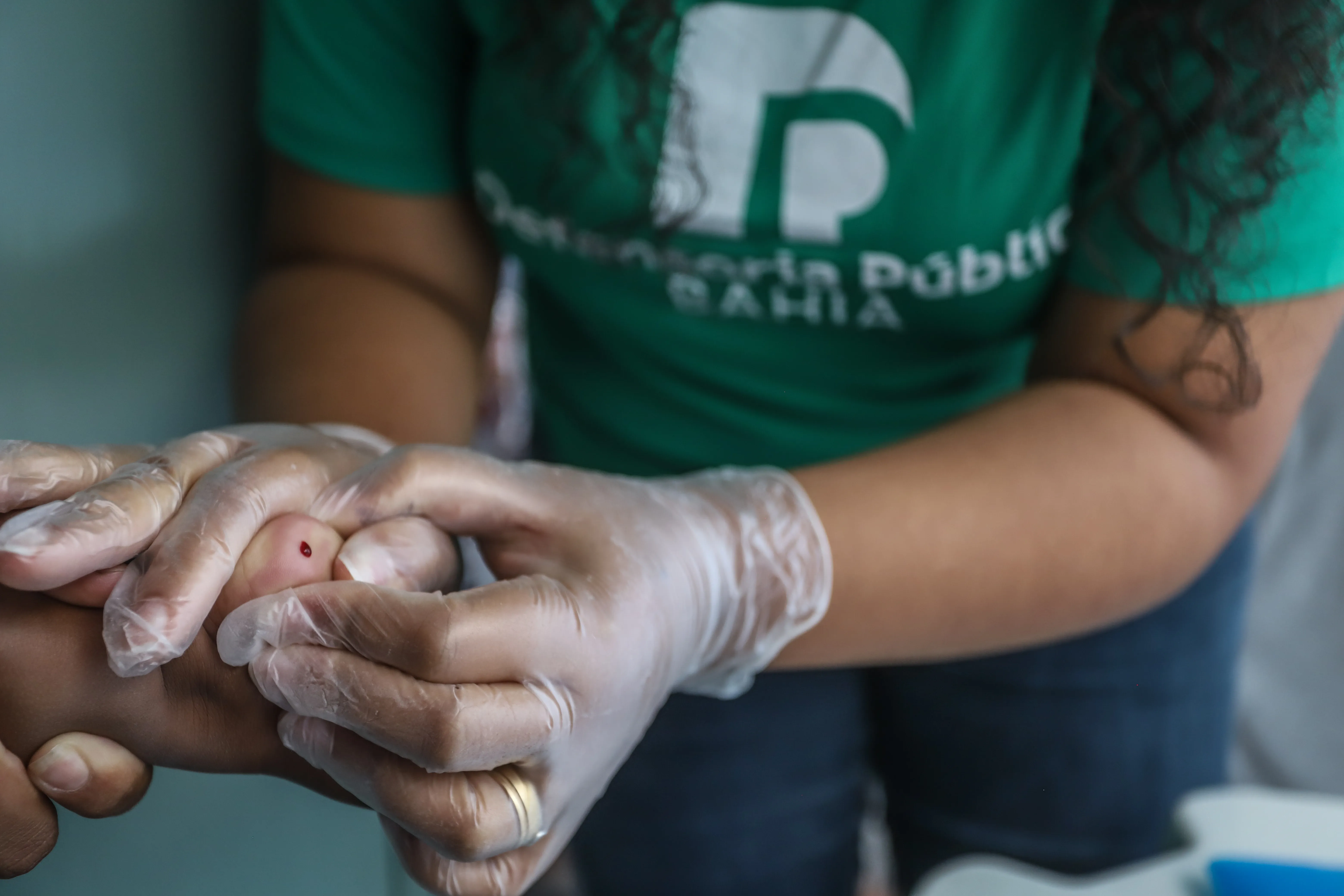 Bebê fazendo exame de DNA durante ação Cidadã na Arena Fonte Nova