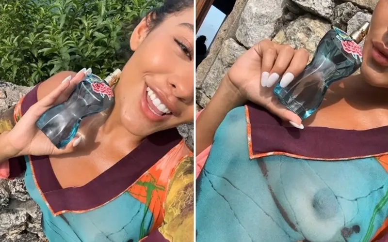 O que chamou a atenção foi um detalhe da blusa a qual ela vestia.