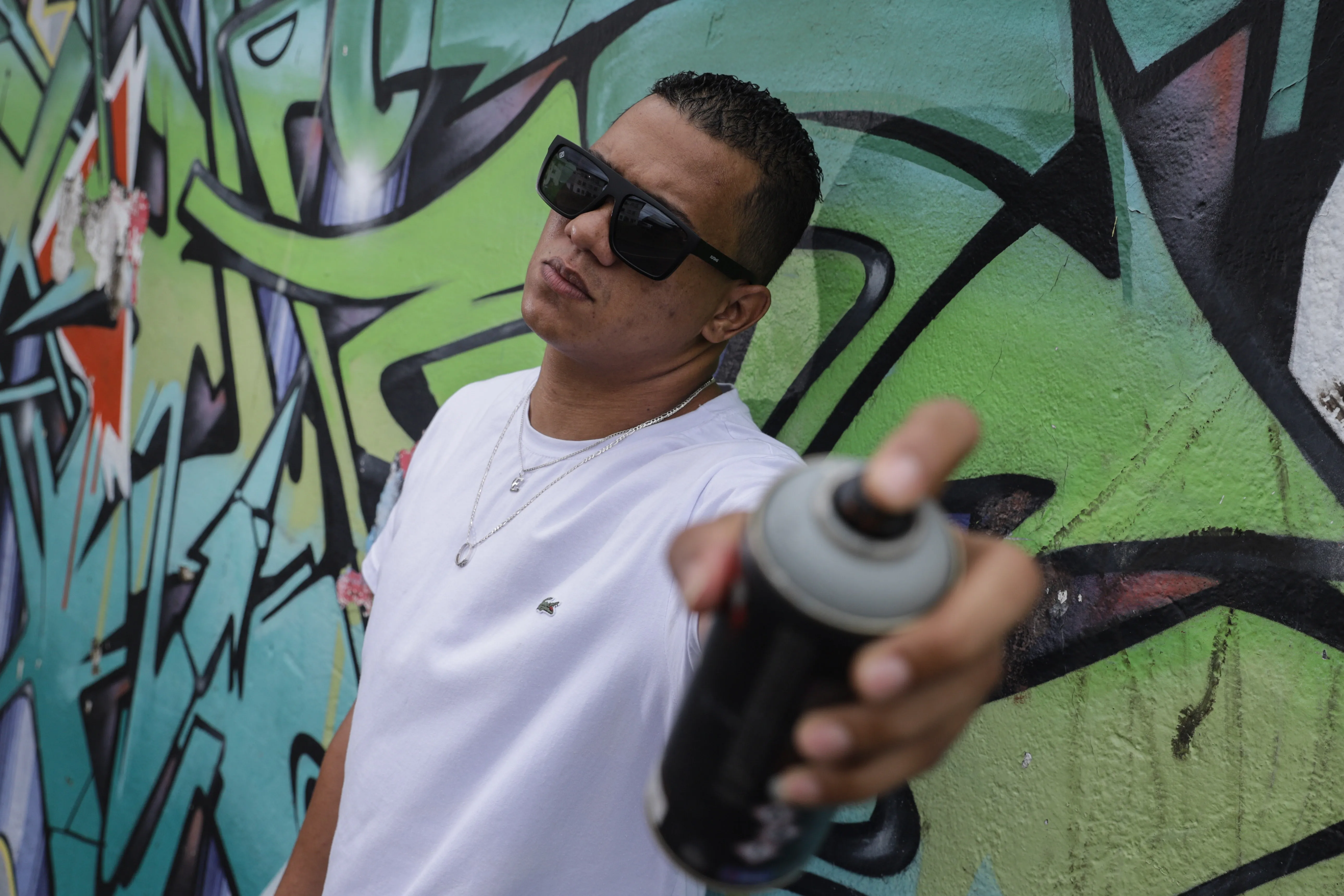 “O grafite salvou 
 minha vida”, afirma Nikol, que já pratica a arte de rua há 18 anos
